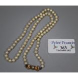 String of graduated cultured pearls with 9ct gold pearl set clasp. (B.P. 21% + VAT)