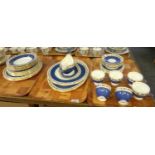 Three trays of Wedgwood English bone china blue and gilt vine pattern items to include: teacups