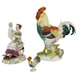 Gruppe aus 3 Figuren, Meissen, 1. Wahl, um 1900/1950. - 1 grosser und 1 kleiner Hahn, Entwurf von