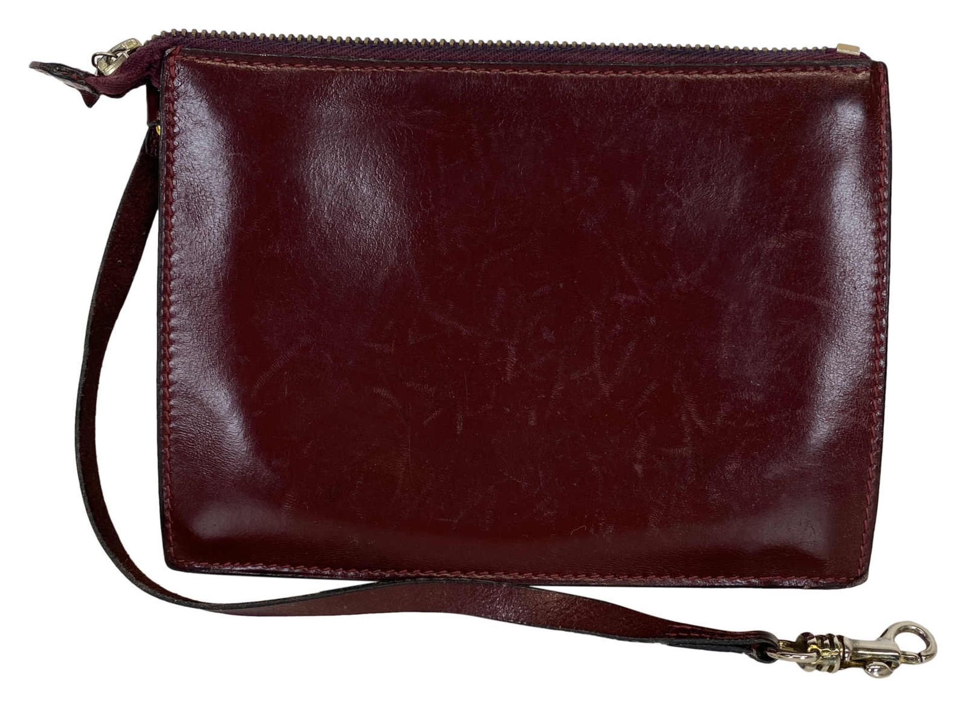 HERMÈS Handtasche Trim Handbag in burgunderrotem Leder aus dem Jahr 1971. Die 1958 entworfene und - Bild 2 aus 5