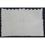 A Cypriot single bed cover hand crocheted in beige