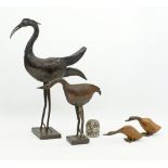 Metal and wood sculptures of birds