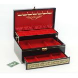 A jewelry box in black leatherette