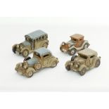 A collection of ceramic toy car models