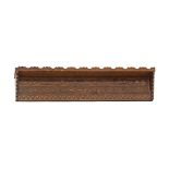 A Cypriot carved stained pine wood wall shelf