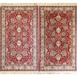 A pair of wool machine made carpets