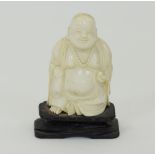 Chinese ivory carving of a seated Buddha