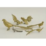 A collection of brass birds