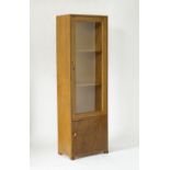 A beechwood tall three shelf bookcase