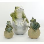Three ceramic garden statues