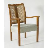 A vintage beech wood armchair