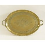 An oval brass tray