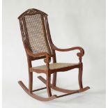 Rocking chair with a wicker seat and back