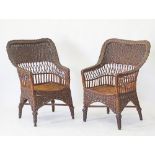 A pair of bamboo and wicker armchairs