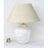 A modern ovoid shaped ceramic table lamp