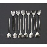 A set of twelve Cypriot silver sweetmeat forks