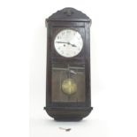 An Arts & Crafts style mechanical wall clock