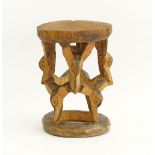 An African Tribal Folk Art carving of a stool from Cameroon.