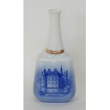 A vintage Royal Copenhagen blue and white decanter for Peter Heering Liqueur