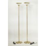 A pair of floor lamps with gilt metal poles