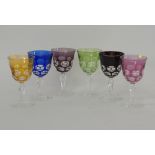 A collection of Rosenthal coloured cut crystal stemmed glasses