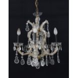 A six light - five arm crystal chandelier