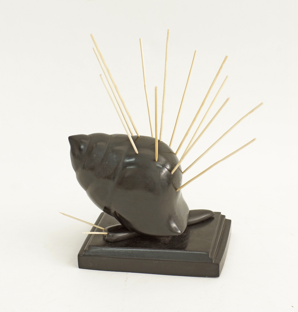 An African ebony hatpin stand