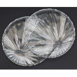 A pair of round cut crystal cake serving dishes