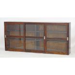 A low stained plywood bookshelves unit