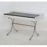 A modern white lacquered and black leather desk