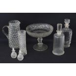 A collection of clear glass decanters