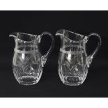 A pair of Rosenthal etched crystal pitchers
