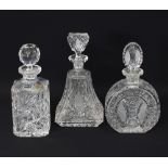 Three Bohemian cut crystal decanters with stoppers