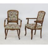 A pair of Cypriot carved beechwood open armchairs