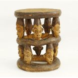 An African Tribal Folk Art carving of a stool from Cameroon.