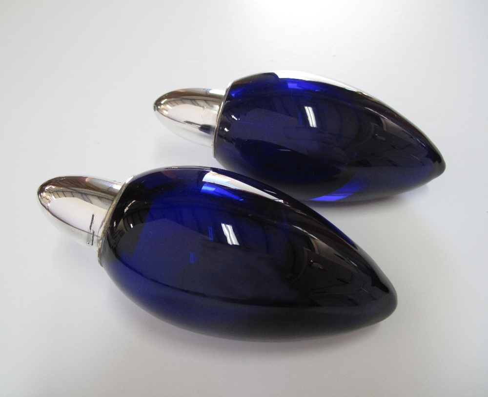 A pair of blue crystal and silver plated salt & pepper shakers
