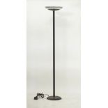 A floor lamp with a black metal pole