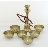 A set of six Egyptian brass bowls together with a Middle Eastern brass nargile
