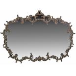 A Rococo style gilt metal framed mirror