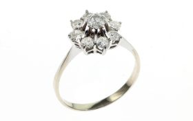 Ring 3.46g 585/- Weissgold mit 1 Diamant ca. 0.25 ct. G/si-pi und 8 Diamanten 0.80 ct. G/si-pi. Ring