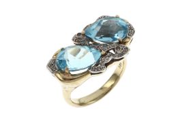 Ring 15.03g 585/- Gelbgold und Weissgold mit 10 Diamanten ca. 0.10 ct. und Aquamarinen. Ringgroesse 