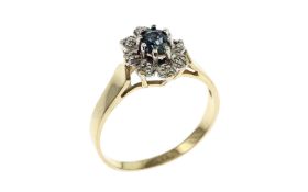 Ring 2.36g 585/- Gelbgold und Weissgold mit 8 Diamanten zus. ca. 0.08 ct. und Smaragd. Ringgroesse c