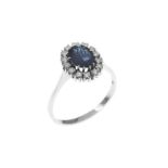 Ring 4.96g 750/- Weissgold mit 14 Diamanten zus. ca. 0.56 ct. F/vvs-vs und Saphir. Ringgroesse ca. 6