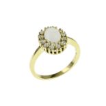 Ring 2.88g 333/- Gelbgold mit Opal und Zirkonia. Ringgroesse ca. 56