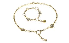 Kette und Armband ges. 19.43g 585/- Gelbgold und Weissgold. Laenge ca. 50 cm (Kette) + ca. 20 cm (Ar