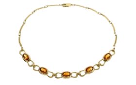 Collier 38.95g 585/- Gelbgold mit Citrinen. Laenge ca. 44 cm