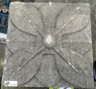 A reconstituted stone Wall Plaque depicting a flower, 9in x 9in