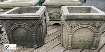 A pair carved Gritstone Gothic Planters, 16in high x 18in x 18in
