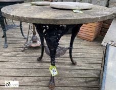 An original cast iron Britannia Conservatory Table Base, with round Yorkshire Stone top, makers mark