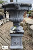 A reconstituted stone Campania Urn on plinth, with fluted and classical decoration, 44in high x 26in